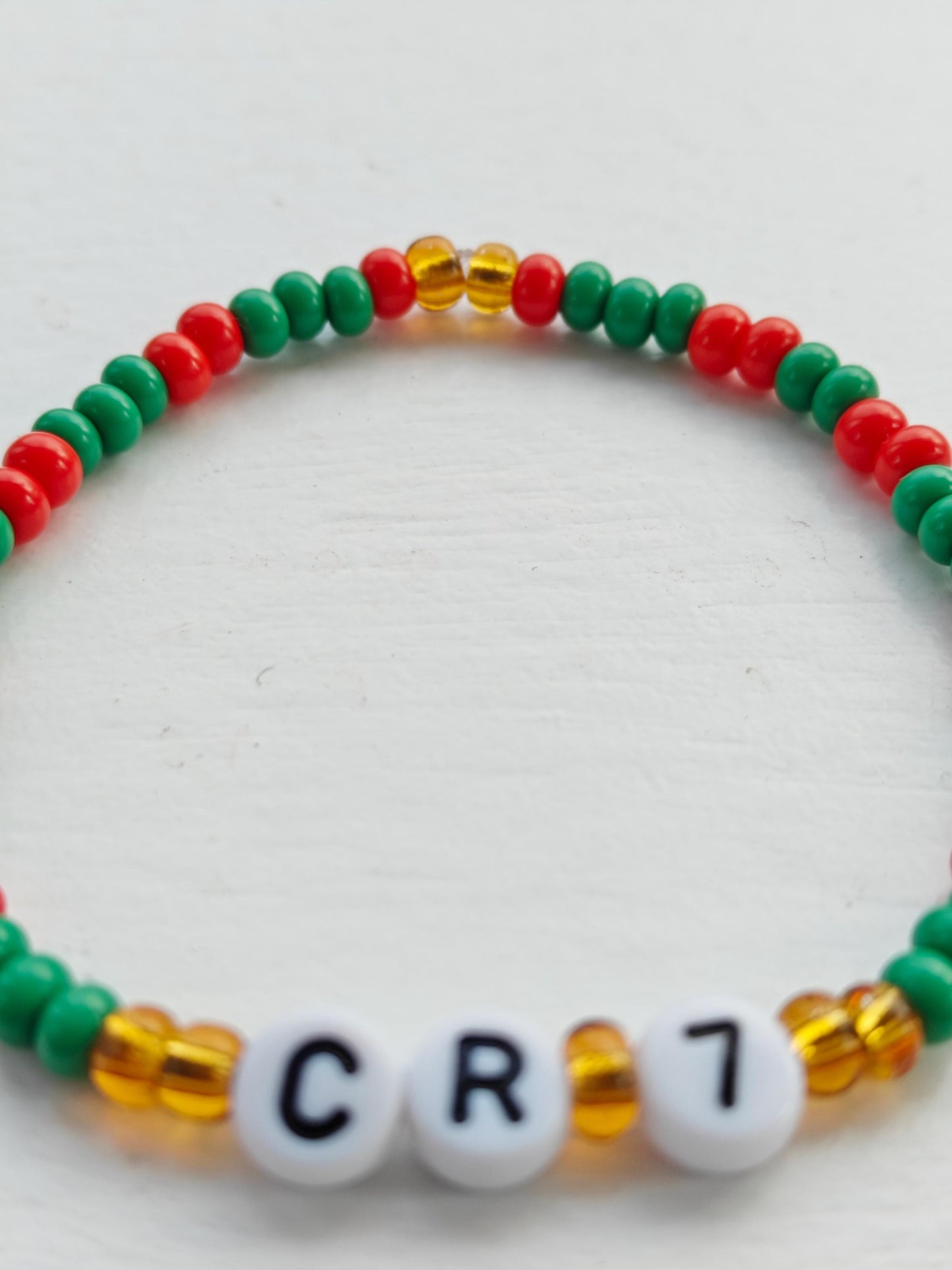 Cristiano Ronaldo Portugal CR 7 bead bracelet on elastic string in red, green and gold