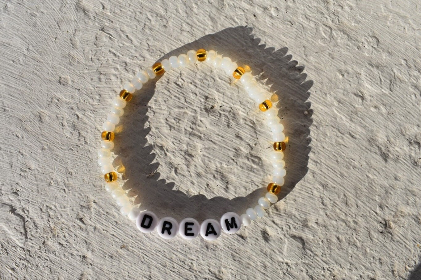 Dream glass seed bead bracelet in shades of pearl, gold and white