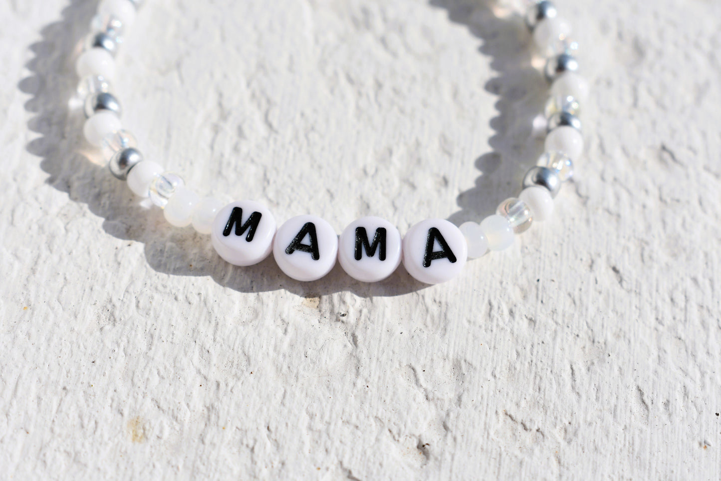 Mama bead bracelet in silver and white