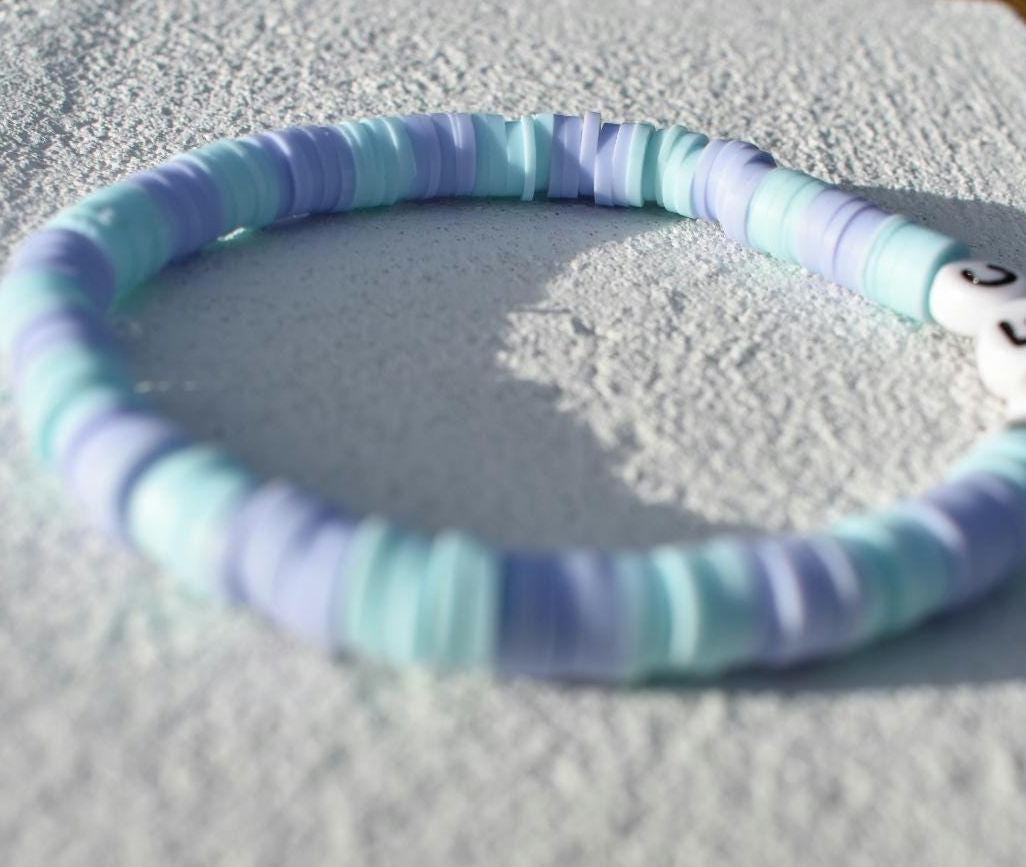 Arsenal womens football club glass or clay bead Bracelet, in new 24/24 third kit purple and blue colors on elastic stretch string