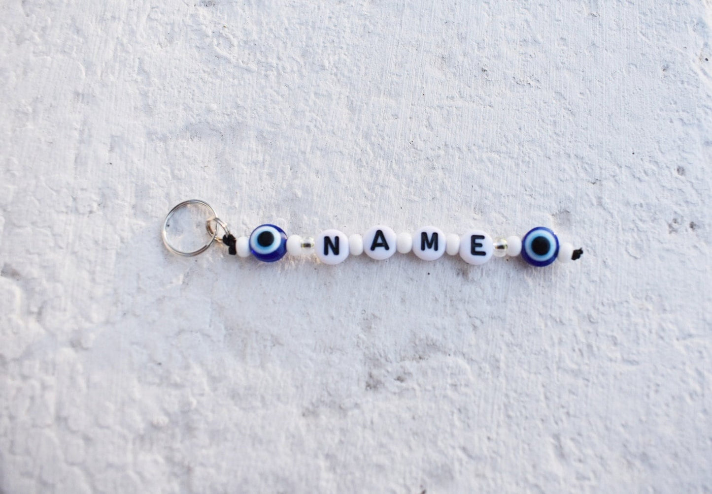 Evil eye keychain with name personalisation