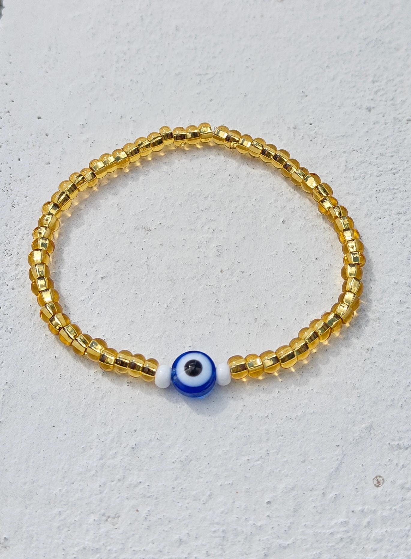 Seed Bead Evil Eye Bracelet – Gold Glass Beads with Blue Centre Charm | Evil Eye Protection | Boho Bracelet