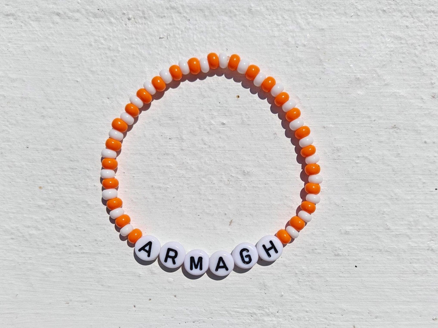 Armagh GAA Bracelet – Handmade Orange & White Beaded Jewellery with Free Shipping