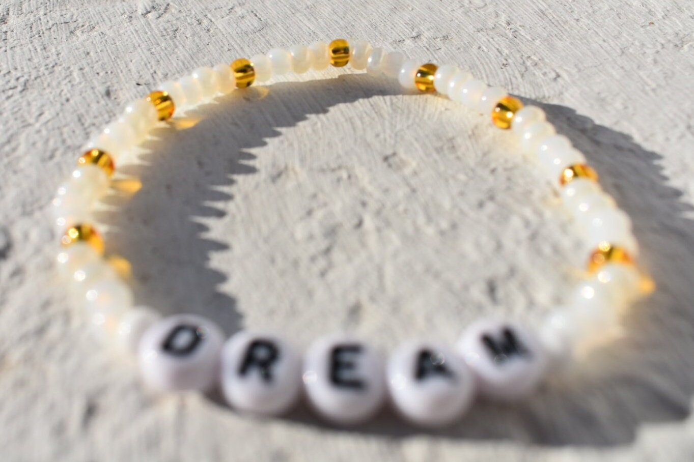 Dream glass seed bead bracelet in shades of pearl, gold and white