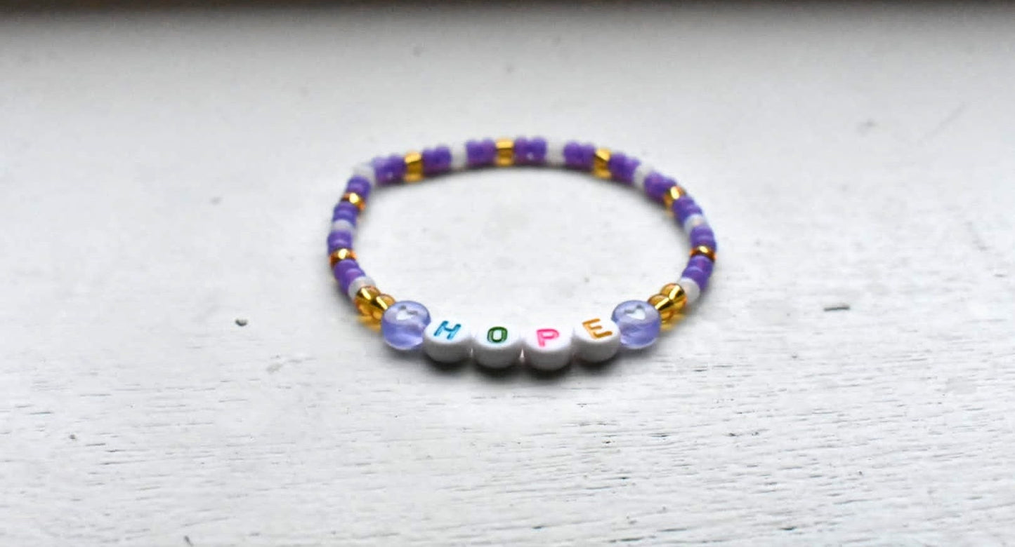 Purple and gold Hope bead bracelet