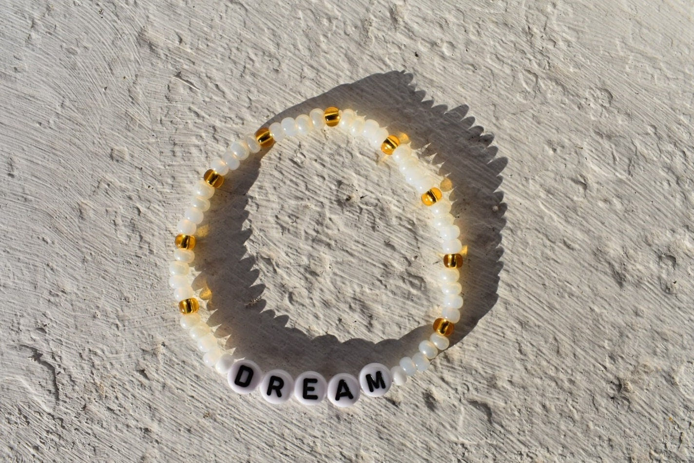 Dream glass seed bead bracelet in shades of pearl, gold and white