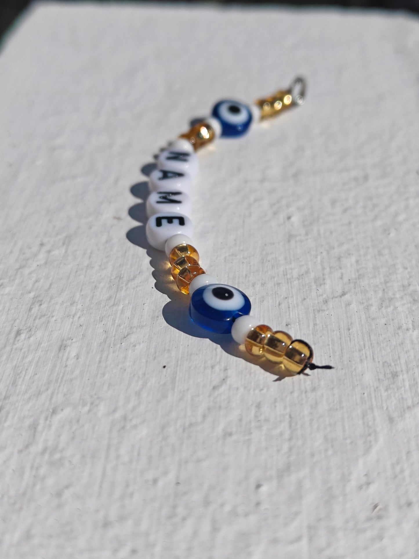 Custom Gift Evil Eye Keychain in Gold and White Seed Beads with Name Personalisation