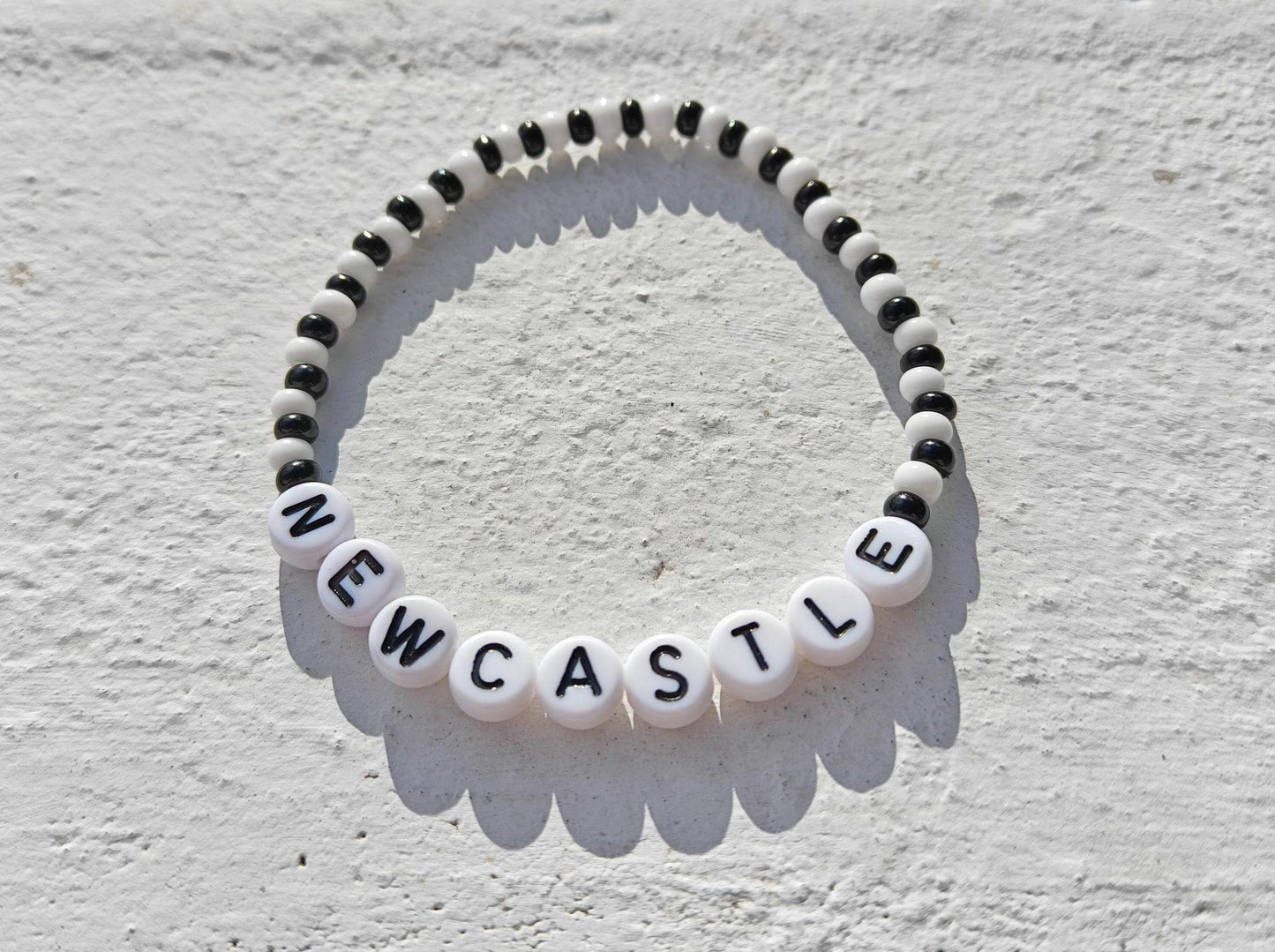 Newcastle Bracelet – Handmade Black & White Football Fan Jewelry | Beaded Stretch Bracelet for Newcastle United Supporters