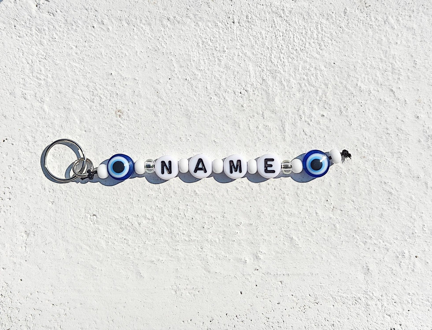 Evil eye keychain with name personalisation