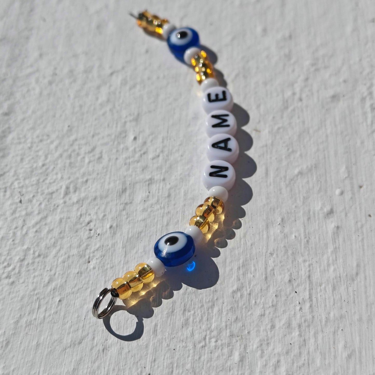 Custom Gift Evil Eye Keychain in Gold and White Seed Beads with Name Personalisation