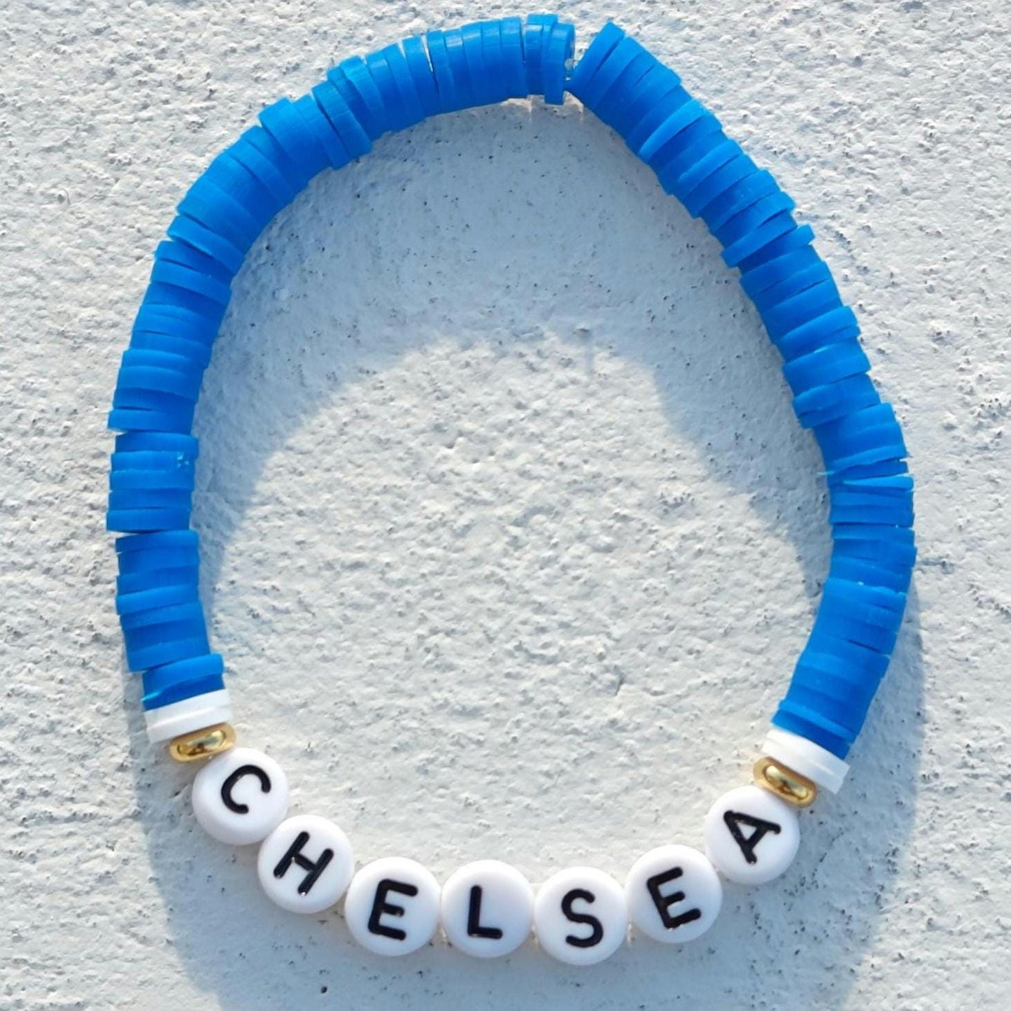 Chelsea clay bead Bracelet in blue and white with gold plated beads
