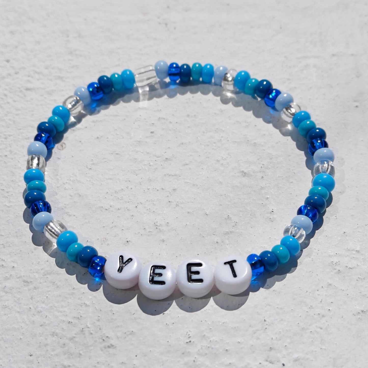 YEET Beaded Bracelet – WWE Inspired Blue & White Stretchy Bracelet | Funny Gift for Wrestling Fans | Meme Jewelry | Handmade Accessory