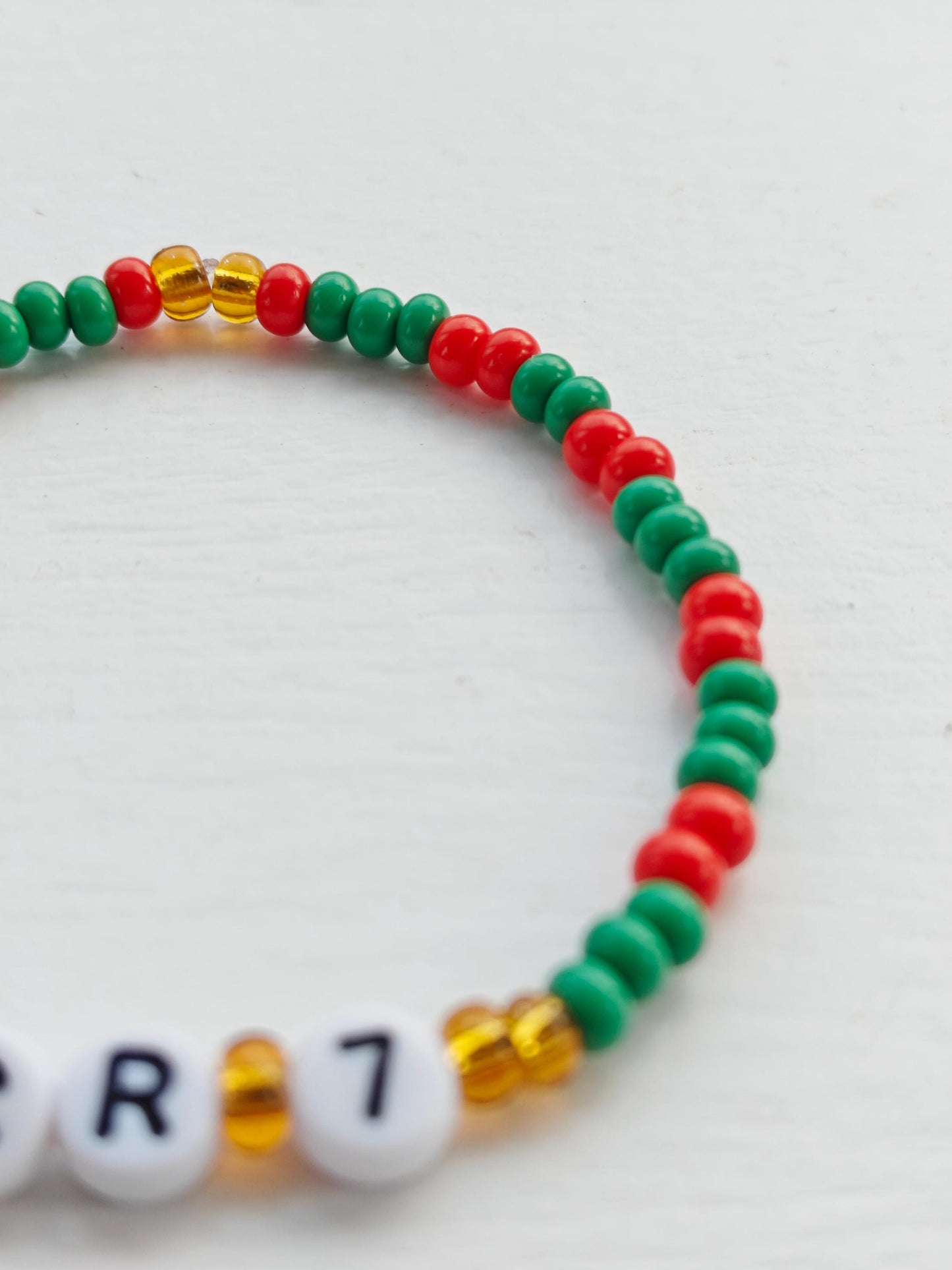 Cristiano Ronaldo Portugal CR 7 bead bracelet on elastic string in red, green and gold