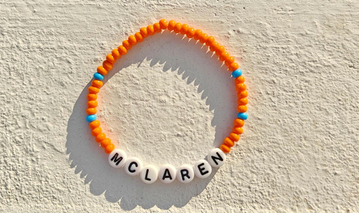 McLaren Beaded Bracelet โ Orange & Blue Stretch F1 Fan Jewelry โ Handmade Racing Gift for Motorsport Lovers