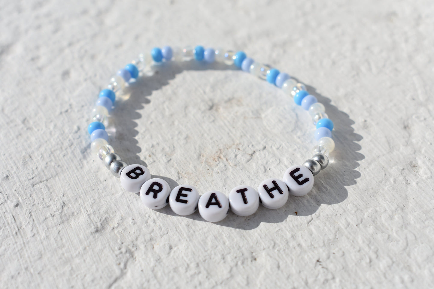 Breathe bead bracelet in blue and silver