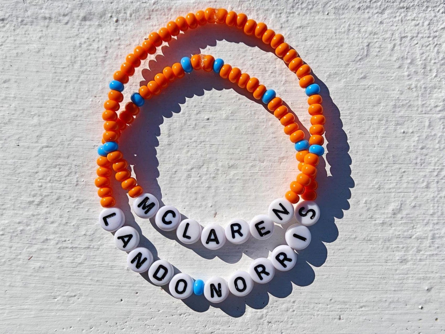 McLaren Beaded Bracelet โ Orange & Blue Stretch F1 Fan Jewelry โ Handmade Racing Gift for Motorsport Lovers