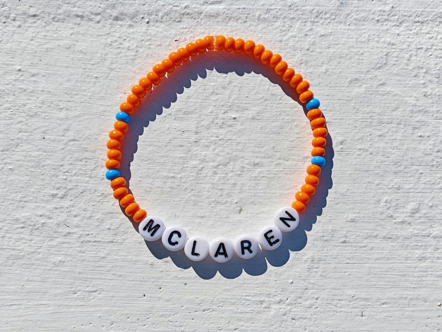 McLaren Beaded Bracelet โ Orange & Blue Stretch F1 Fan Jewelry โ Handmade Racing Gift for Motorsport Lovers