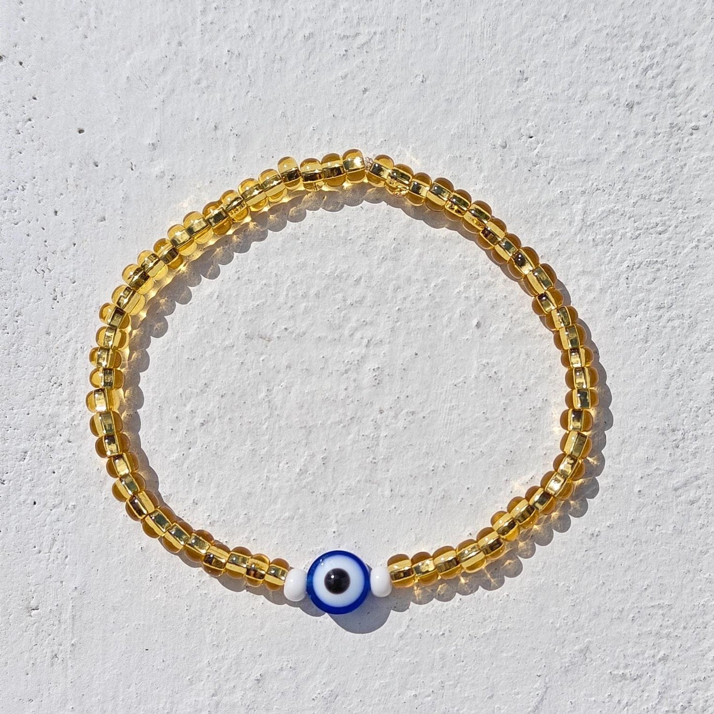 Seed Bead Evil Eye Bracelet – Gold Glass Beads with Blue Centre Charm | Evil Eye Protection | Boho Bracelet