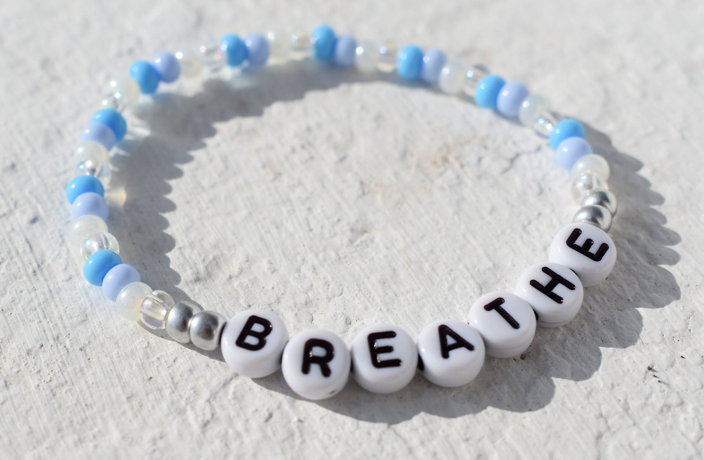 Breathe bead bracelet in blue and silver