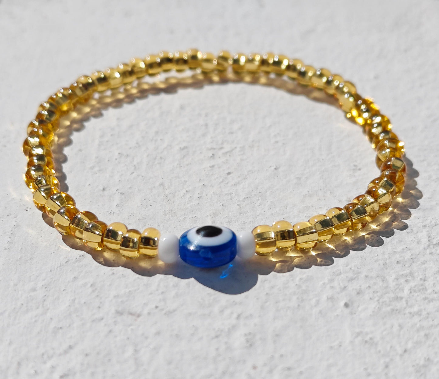 Seed Bead Evil Eye Bracelet – Gold Glass Beads with Blue Centre Charm | Evil Eye Protection | Boho Bracelet