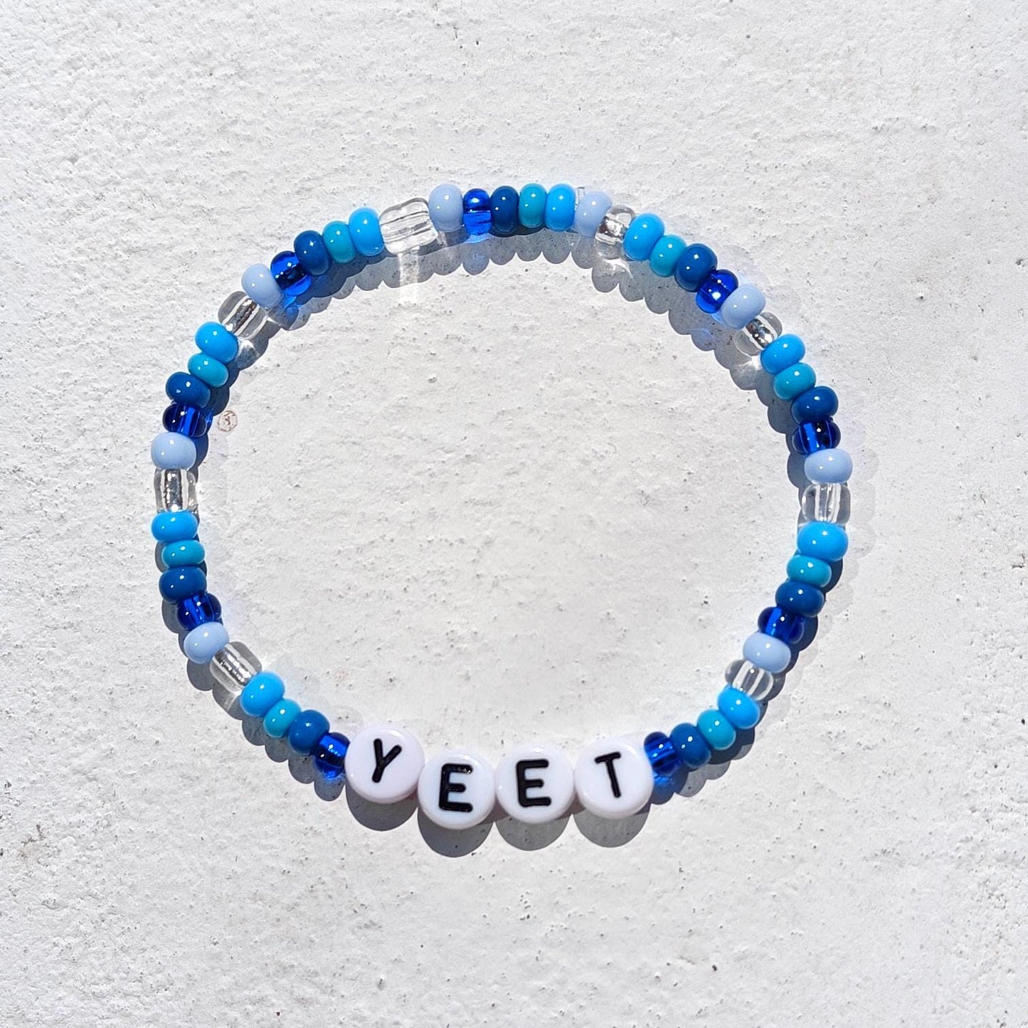 YEET Beaded Bracelet – WWE Inspired Blue & White Stretchy Bracelet | Funny Gift for Wrestling Fans | Meme Jewelry | Handmade Accessory