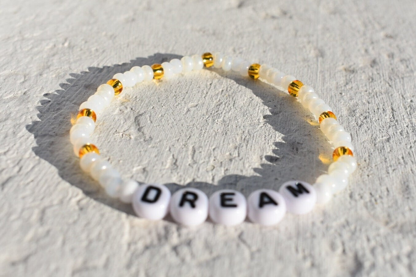 Dream glass seed bead bracelet in shades of pearl, gold and white