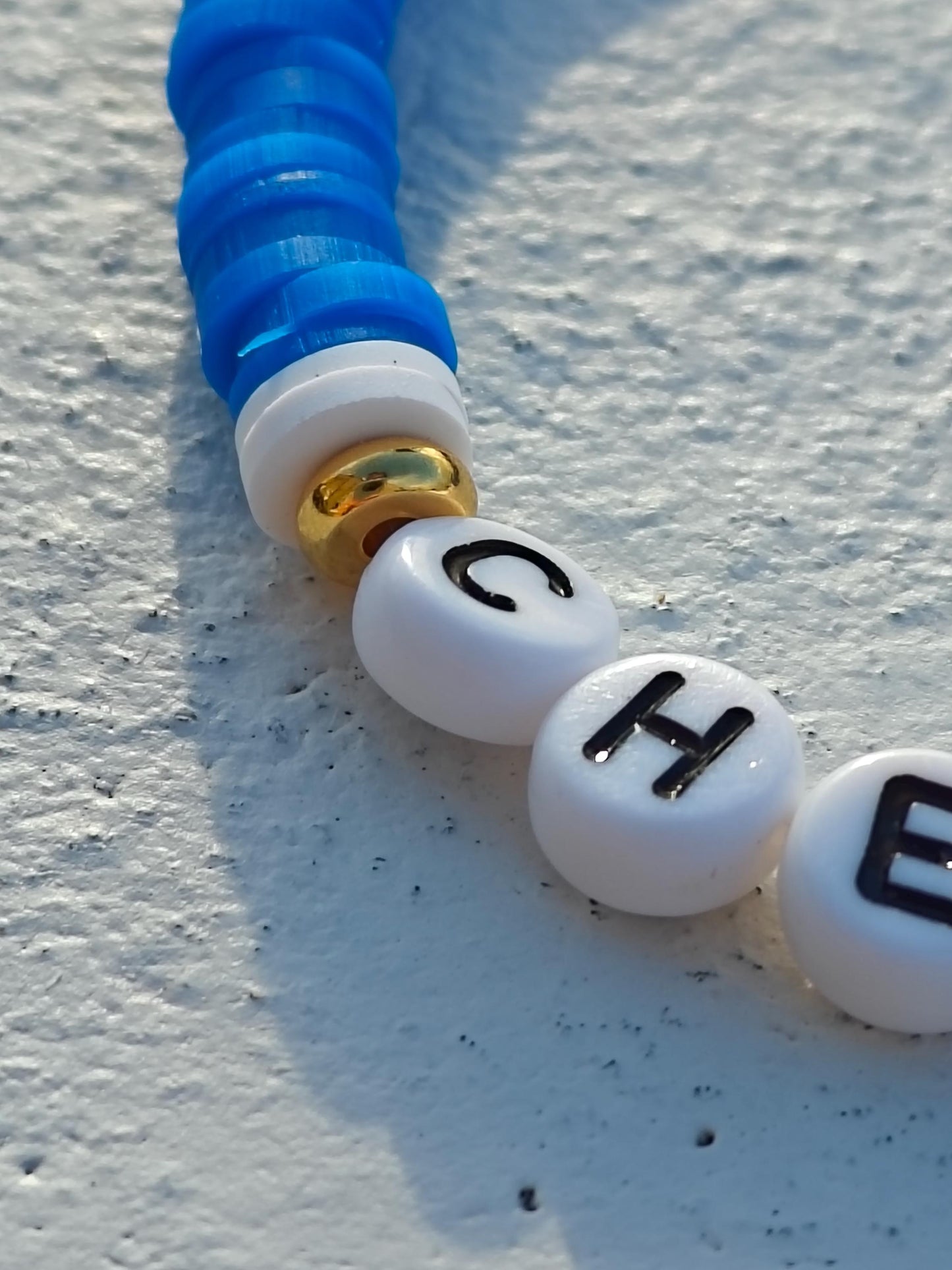 Chelsea clay bead Bracelet in blue and white with gold plated beads
