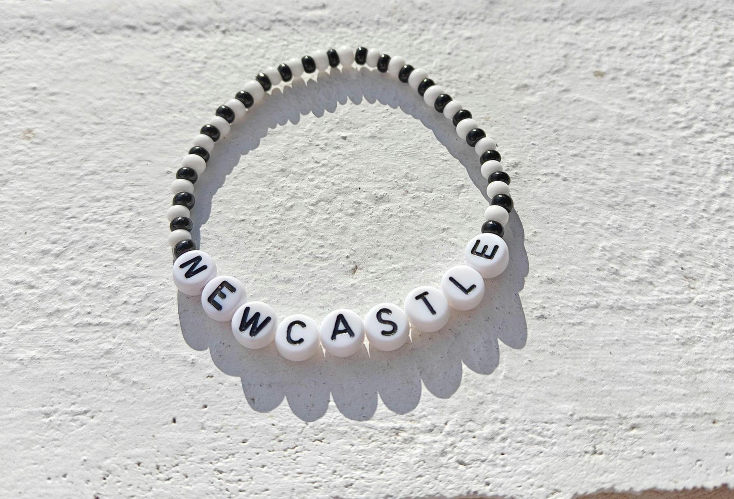 Newcastle Bracelet – Handmade Black & White Football Fan Jewelry | Beaded Stretch Bracelet for Newcastle United Supporters