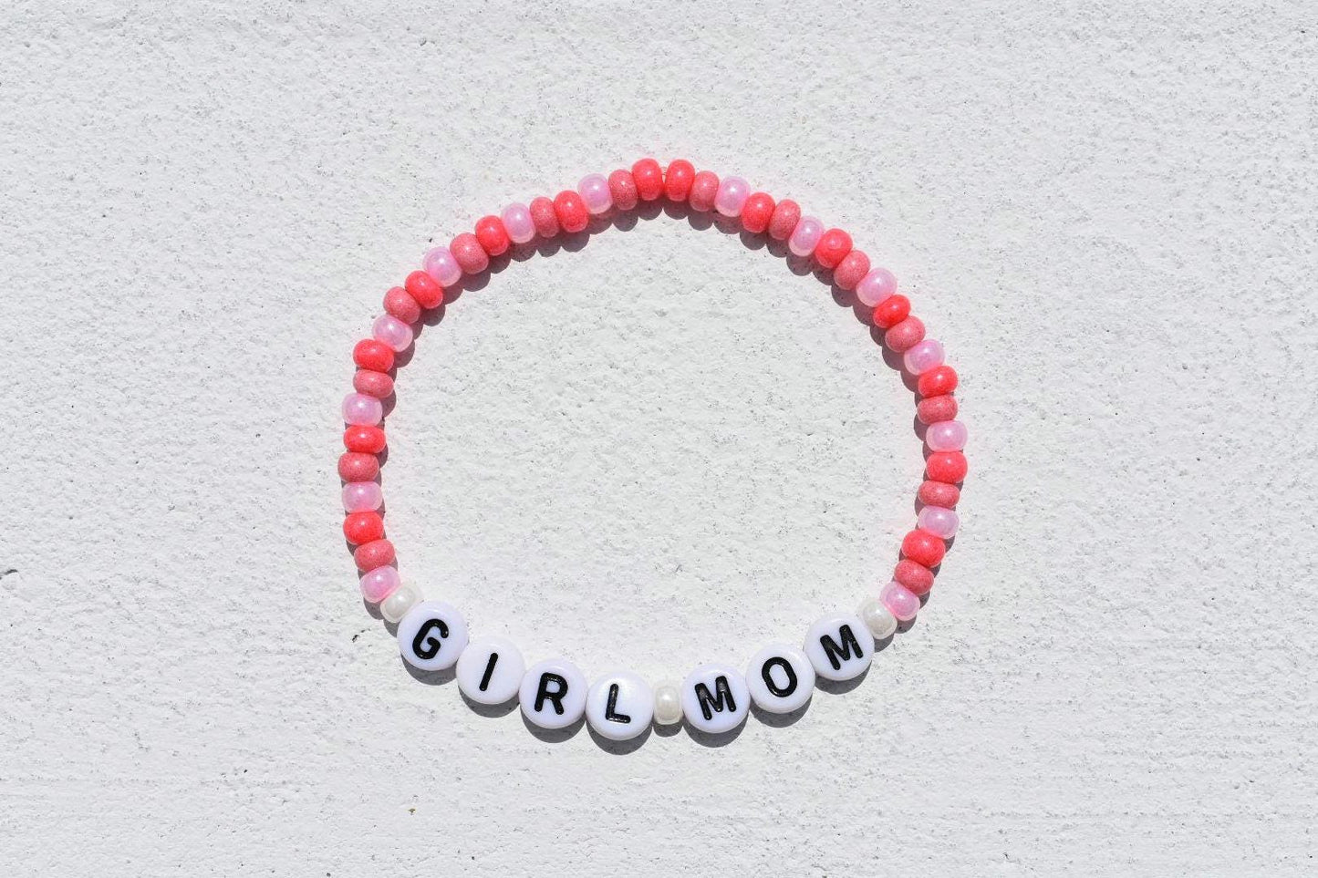 Mother Girl Mom or Boy Mom bracelets in pink and blue styles
